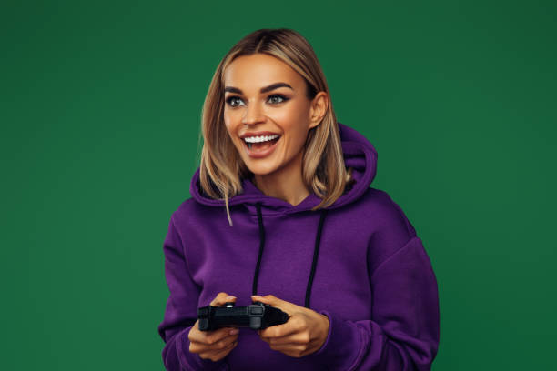Woman holding joystick and playing