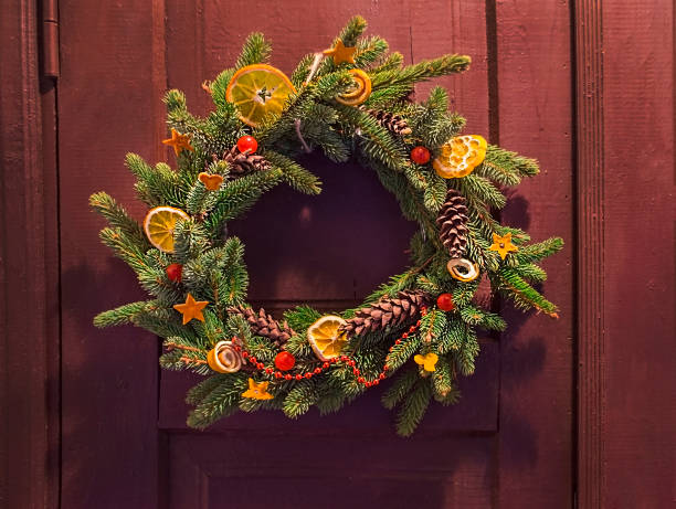 istock Christmas environmentally friendly gift decorations. Christmas wreath on a wood 1381311298