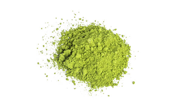 istock Green matcha powdered tea isolated on white background 1381311572
