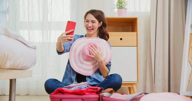 istock woman takes selfie 1381313088