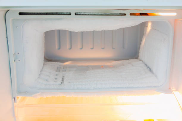 istock freezer compartment of the refrigerator is very thick with ice 1381322497