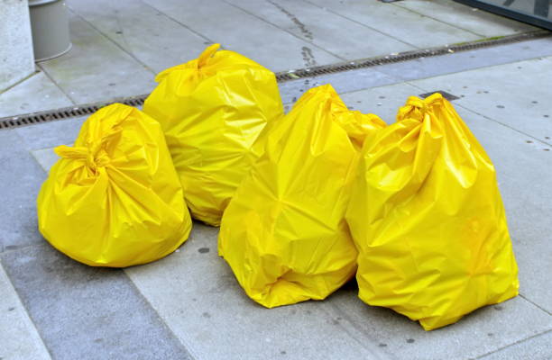 Garbage bags on the street stock photo