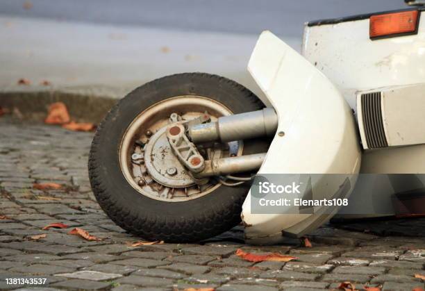 Scooter Down In The Street Stock Photo - Download Image Now - Motor Scooter, Crash, Motorcycle