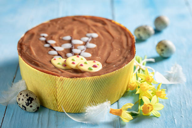 Homemade Easter cake made with yellow daffodils Homemade Easter cake made with yellow daffodils Easter chocolate cake with eggs. easter cake stock pictures, royalty-free photos & images