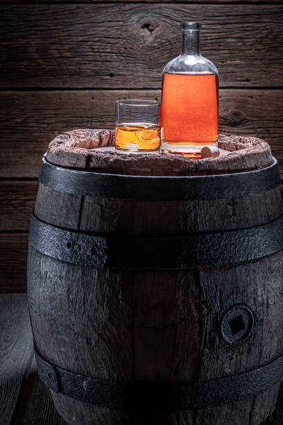 istock Noble cognac in dark and old distillery warehouse. 1381353945