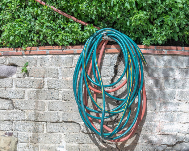istock Gardening Hose on a Wall. 1381362676