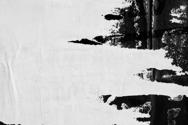 istock Blank black white old ripped torn paper crumpled creased posters grungy textures backdrop backgrounds surface placard 1381373983