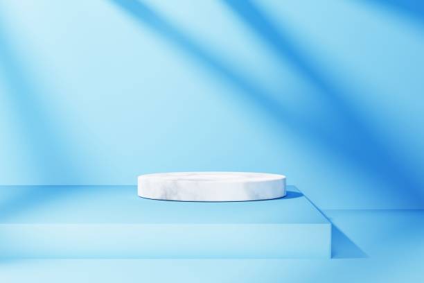 istock White 3d podium empty with window shadow on blue abstract background. Copy space of product mock up presentation. 1381420717