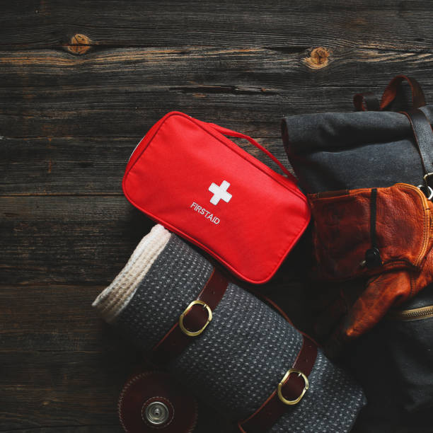 istock first aid kit and trekking equipment 1381422401