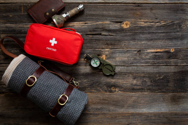 istock first aid kit and trekking equipment 1381422405