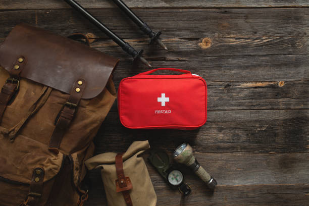 istock first aid kit and trekking equipment 1381422408