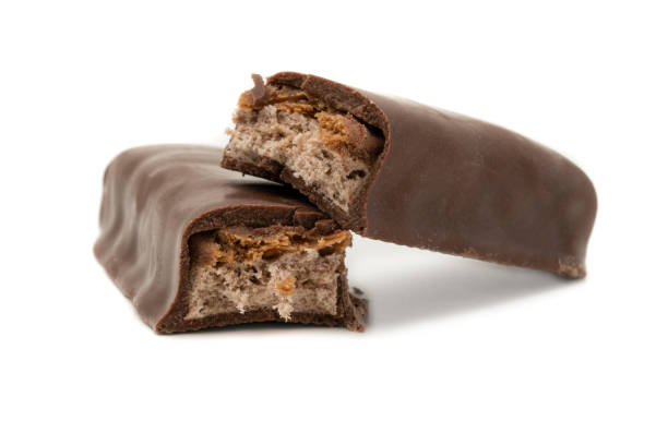 istock Caramel chocolate bar isolated  on white background. 1381426688