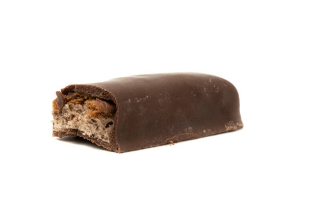 istock Caramel chocolate bar isolated  on white background. 1381446519