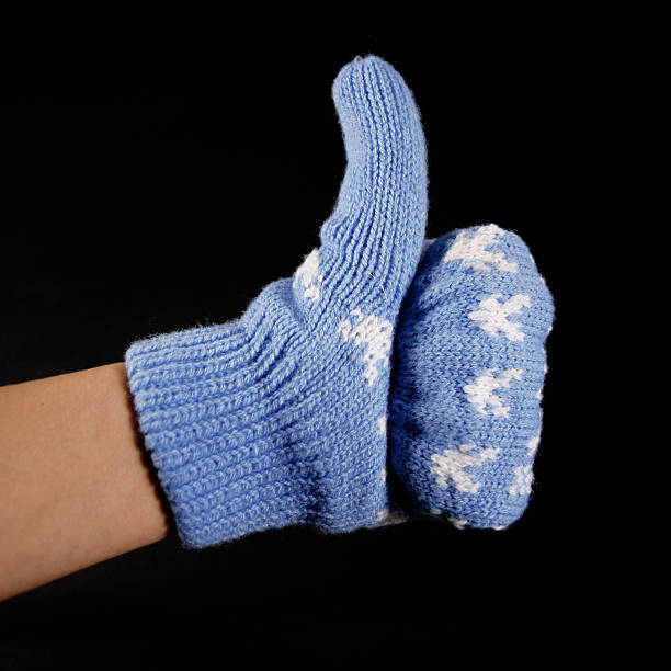 istock Hand in blue mittens show gesture ok 138146165