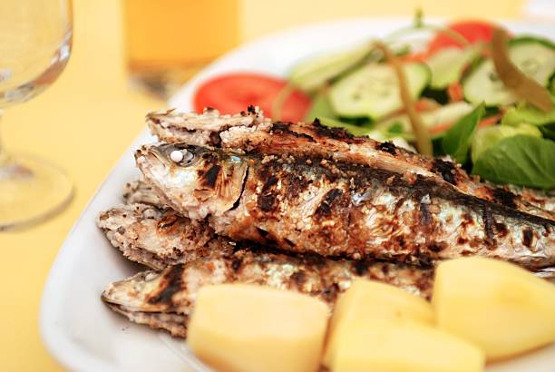 istock Grilled sardine with potato and salad 138146313
