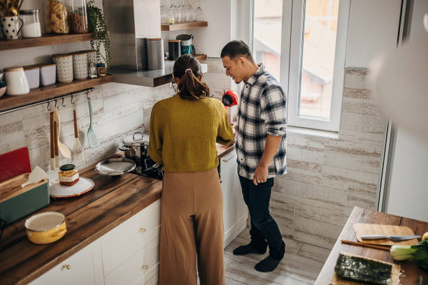istock Couple preparing lunch together 1381465457