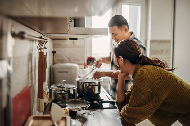 istock Man cooking for wife 1381466067
