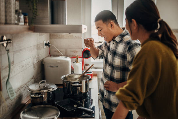 istock Man cooking for wife 1381467100
