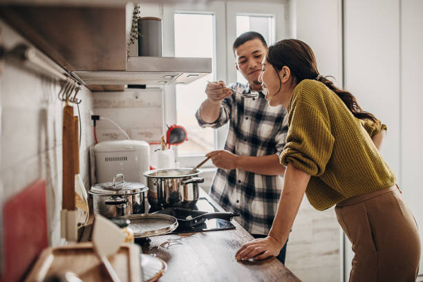 Man cooking for wife