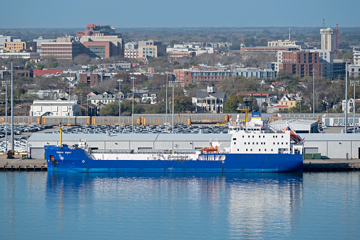 Charleston, SC, USA - March 06, 2022: Pacific Egret, a 104-meter nuclear waste carrier owned by Pacific Nuclear Transport, flagged to United Kingdom, moored at Columbus Terminal in Charleston Harbor.