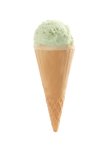 istock Delicious ice cream in waffle cone isolated on white 1381477629