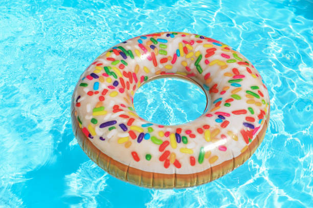 istock Inflatable circle donut floats in the pool 1381480454