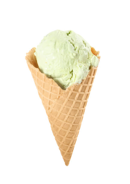 istock Delicious ice cream in waffle cone isolated on white 1381484897