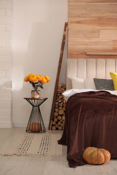 istock Cozy bedroom interior inspired by autumn color scheme 1381497134