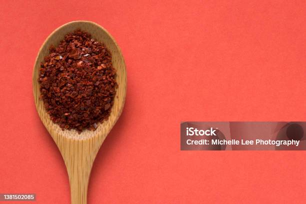 Aleppo Peppers On A Wood Spoon Stock Photo - Download Image Now - Food, Aleppo, Close-up