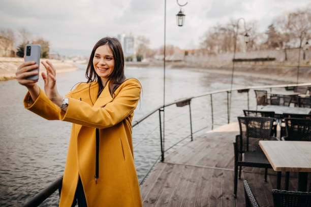 istock Girl enjoys by the river 1381517250