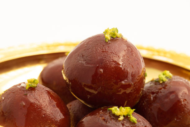 Kala Jamun Also Called Dark Gulab Jamun Is Milk Solids Based Mithai Made of Mashed Khoya Grated Paneer Elaichi Khoa Panir In Cheeni Ki Chasni. Food Theme For Holi, Deepawali, Rakshabandhan, Dussehra