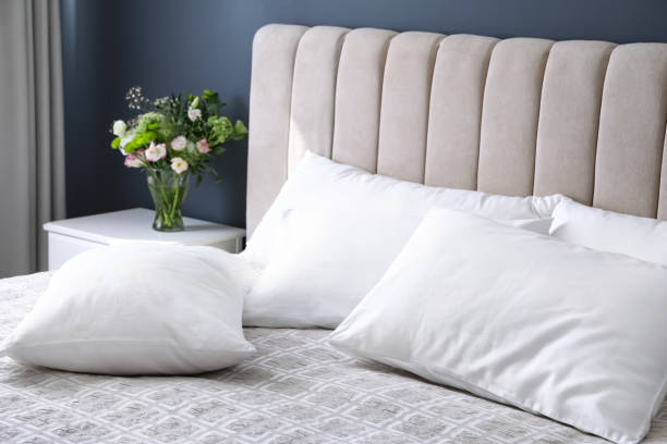 comfortable bed with soft pillows indoors, closeup - pillow imagens e fotografias de stock