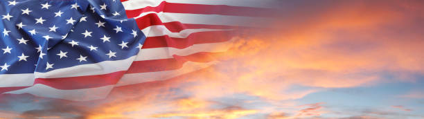 U.S.flag and sky American flag in sunny sky. Wide web header banner independence day holiday stock pictures, royalty-free photos & images