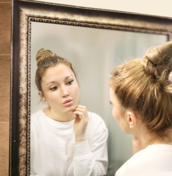 istock Applying the cream.Magic anti-aging cream. 1381560626