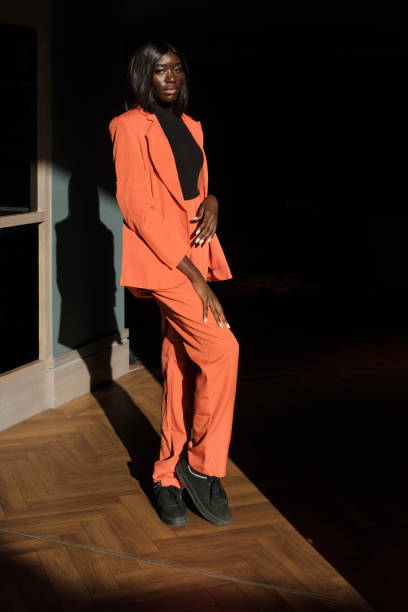 istock Black young model posing in a hotel lobby. 1381562775