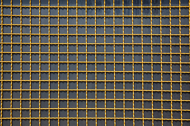 Yellow lattice on a black background stock photo