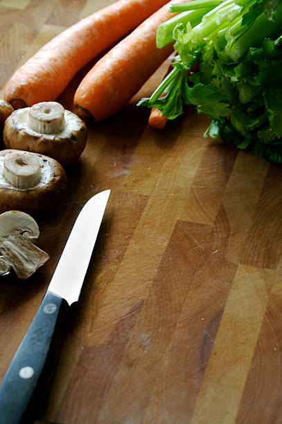 istock Knife and vegetables on a cutting board. 138156867