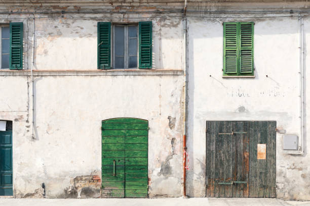 istock Old houses in a sunny day, exterior 1381569139