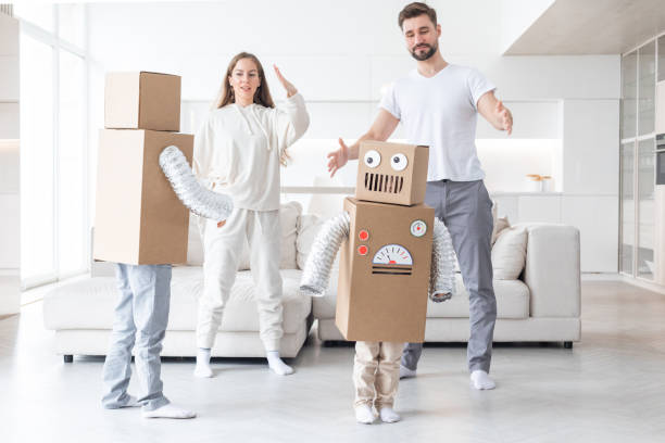 istock Happy family playing dancing like robots 1381572025