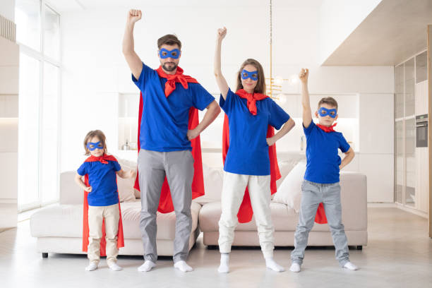istock Superhero family at home 1381572061