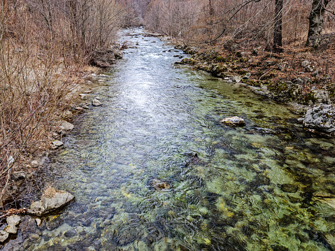 Beautiful mountain river, clear water, with beautiful colors in winter