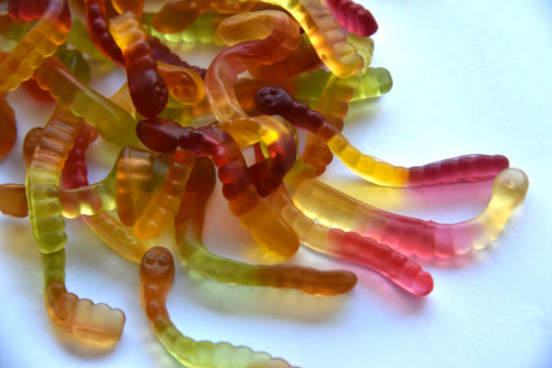istock Colorful delicious marmalade worms on a plate 1381586326