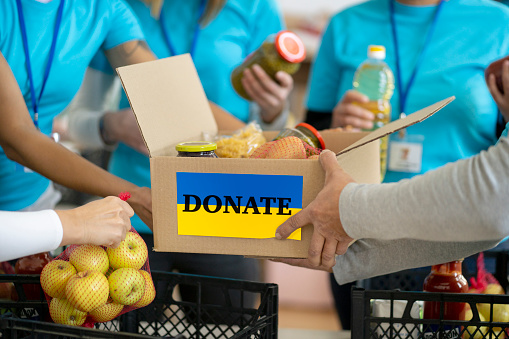 Volunteers preparing donation boxes for people in need in Ukraine