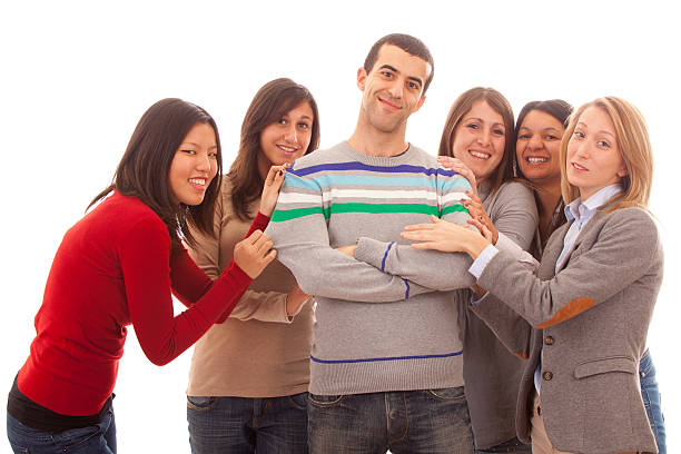 istock Young Man with Many Women Around 138160484
