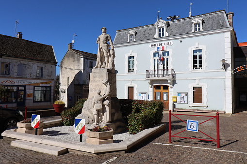 The war memorial in front of the town hall of the village, city of Cuisery, department of Saône et Loire, France
