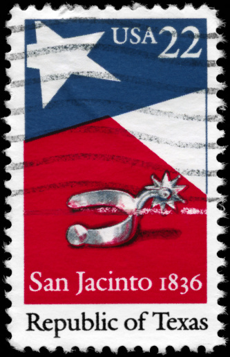A Stamp printed in USA shows the Texas State Flag and Silver Spur, devoted to Republic of Texas, 150th Anniv., circa 1986