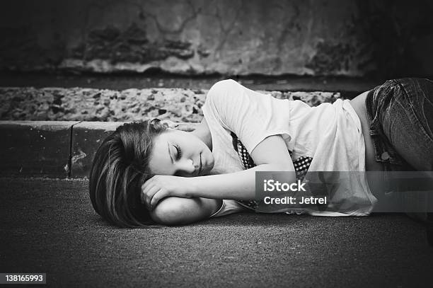 Portrait Of Sleeping Young Girl On Asphalt Black And White Stock Photo - Download Image Now