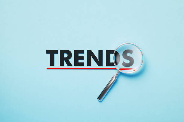 istock Magnifier Forming Trends Word On Blue Background 1381662393