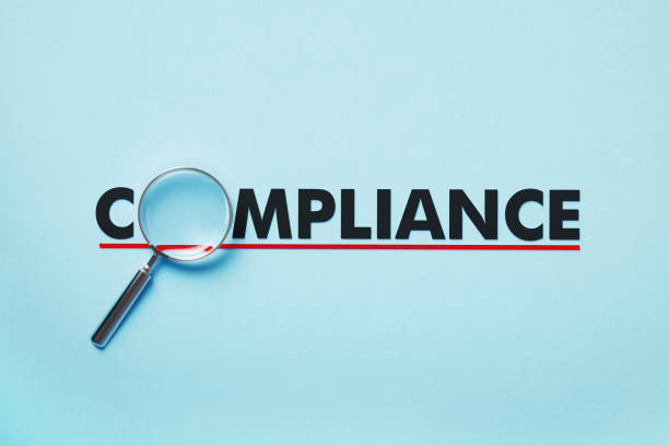 Magnifier Forming Compliance Word On Blue Background Magnifier forming compliance word on blue background. Horizontal composition with copy space. Compliance concept. obedience stock pictures, royalty-free photos & images