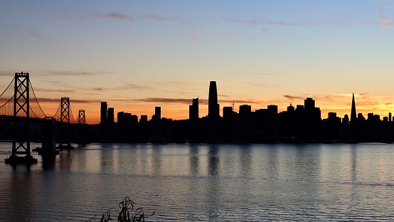 Silhouette view of the San Francisco skyline from Treasure Island in Winter 2022